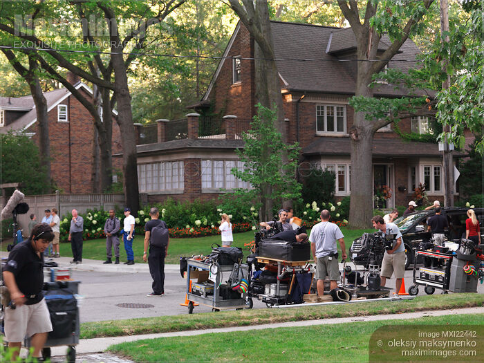Stock photo of Film Crew Setting up Equipment for a Movie Shoot Buy commercial use license at MaximImages