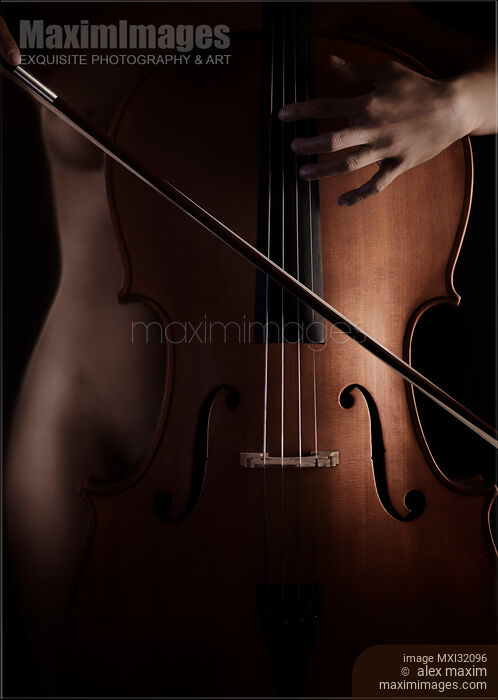 Fine art nude mysterious concept woman playing cello closeup of hands and a bow Stock photo of Fine art nude mysterious concept woman playing cello closeup of hands and a bow Buy commercial use license at MaximImages