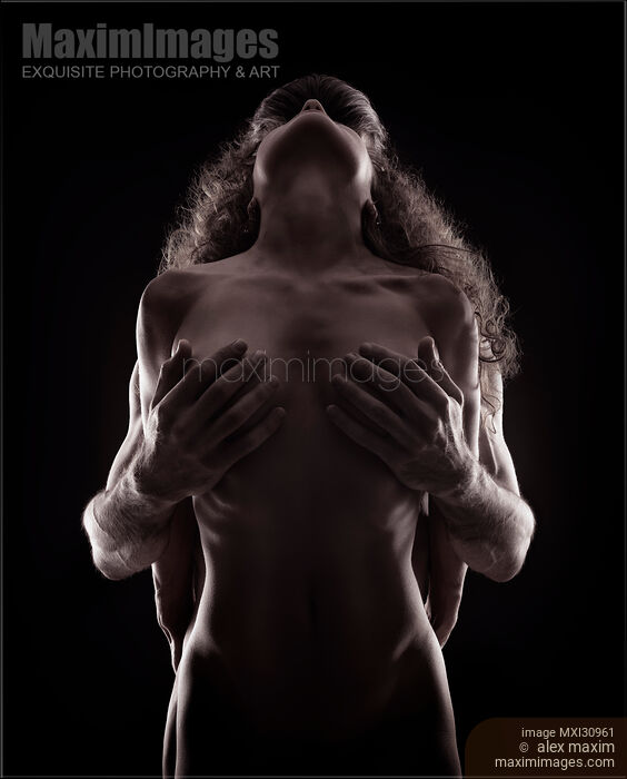Stock photo of Fine art nude portrait of a couple making love Tantric sexuality concept Buy commercial use license at MaximImages