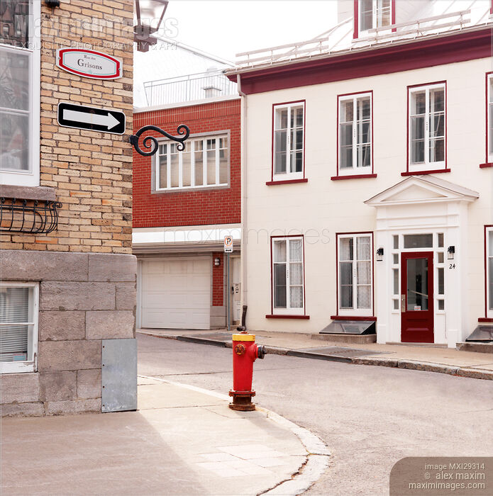 Stock photo of Fire hydrant on a street in Old Quebec City Buy commercial use license at MaximImages