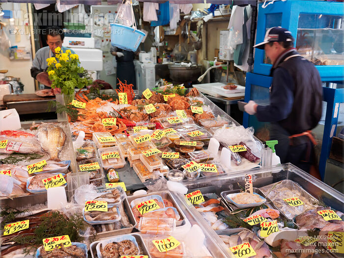 Fish market vendor in Japan Stock photo of Fish market vendor in Japan Buy commercial use license at MaximImages