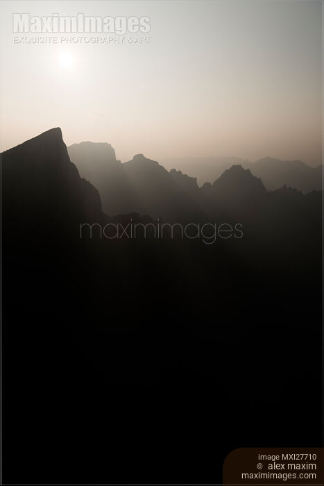 Stock photo of Foggy mountan sunset nature scenery at Tianmen China Buy commercial use license at MaximImages