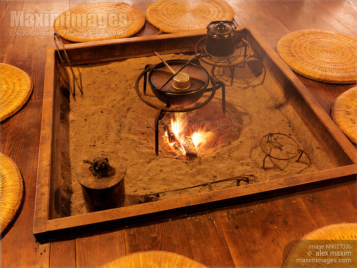 Stock photo of Food being cooked on fire in Japanese historic house Buy commercial use license at MaximImages