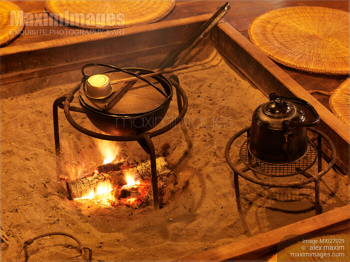 Stock photo of Food cooked on fire in Japanese historic house Buy commercial use license at MaximImages