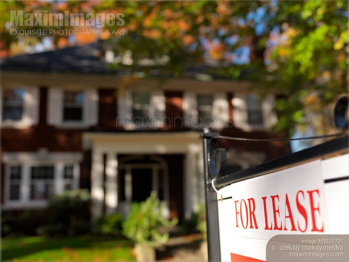 For Lease Sign in Front of a Large House Stock photo of For Lease Sign in Front of a Large House Buy commercial use license at MaximImages