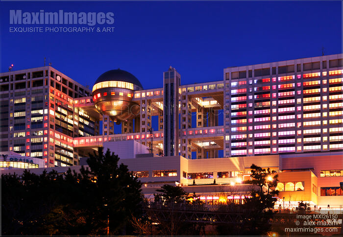 Stock photo of Fuji TV building with colotrful lights at night in Odaiba Tokyo Buy commercial use license at MaximImages