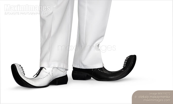 Stock photo of Funny shoes with curled toes Buy commercial use license at MaximImages
