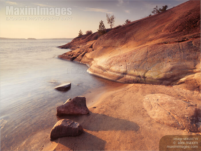 Georgian Bay red rocks landscape at dawn Stock photo of Georgian Bay red rocks landscape at dawn Buy commercial use license at MaximImages