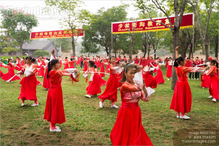 Stock photo of Girls of Tagou Martial arts school in China performing with swords Buy commercial use license at MaximImages