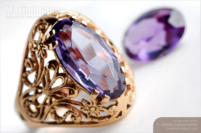 Stock photo of Golden Ring with Alexandrite Gem Stone Buy commercial use license at MaximImages