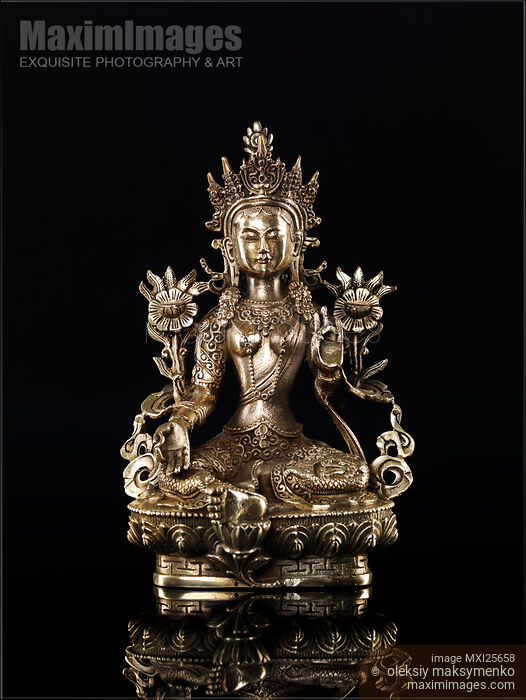 Stock photo of Green Tara Buddhist goddess statue Buy commercial use license at MaximImages