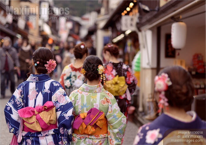 Group of girls in bright Yukatas walking on Matsubara dori street in Kyoto near Kiyomizu-dera Stock photo of Group of girls in bright Yukatas walking on Matsubara dori street in Kyoto near Kiyomizu-dera Buy commercial use license at MaximImages