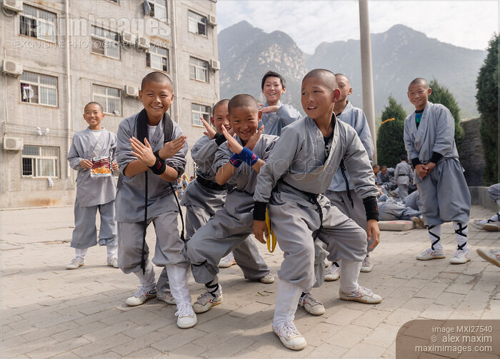 Stock photo of Group of young happy Shaolin students in DengFeng China Buy commercial use license at MaximImages