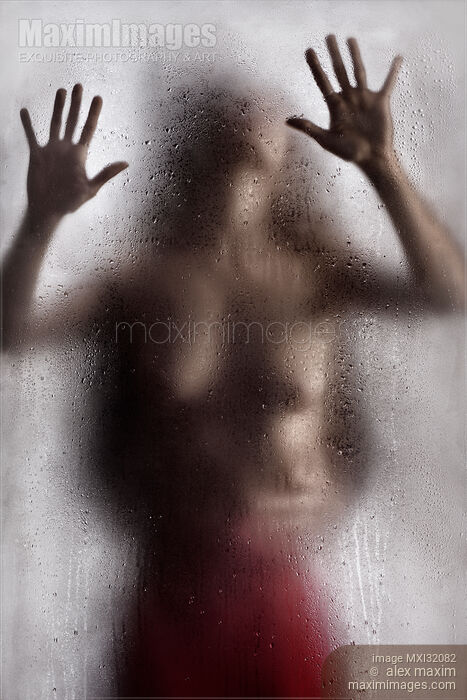 Half nude woman leaning against the glass with man hands around her waist Sensual couple making love Stock photo of Half nude woman leaning against the glass with man hands around her waist Sensual couple making love Buy commercial use license at MaximImages