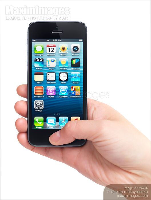 Stock photo of Hand holding iPhone 5 Buy commercial use license at MaximImages