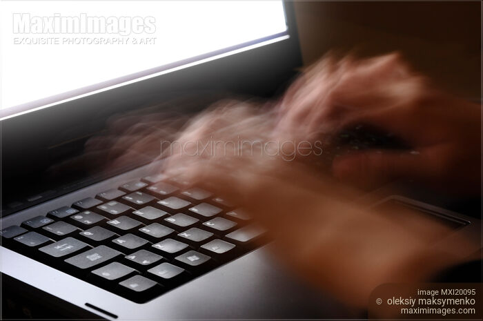 Hands of person typing on computer keyboard Stock photo of Hands of person typing on computer keyboard Buy commercial use license at MaximImages