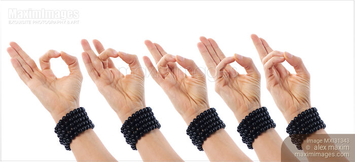 Stock photo of Hands showing five important Yoga Mudras Buy commercial use license at MaximImages
