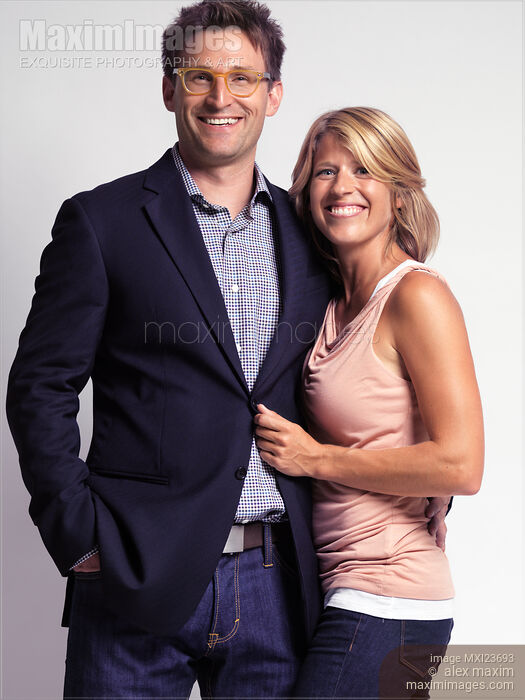 Happy Fashionably Dressed Couple Stock photo of Happy Fashionably Dressed Couple Buy commercial use license at MaximImages