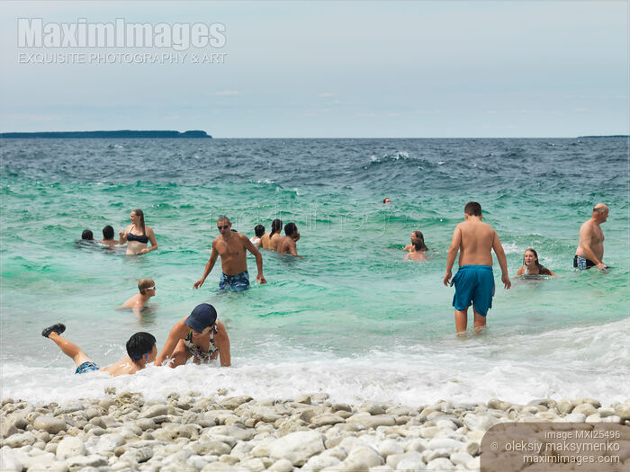 Happy people enjoying summer at Georgian Bay Stock photo of Happy people enjoying summer at Georgian Bay Buy commercial use license at MaximImages