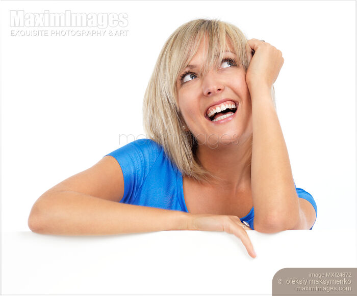 Stock photo of Happy smiling daydreaming woman Buy commercial use license at MaximImages