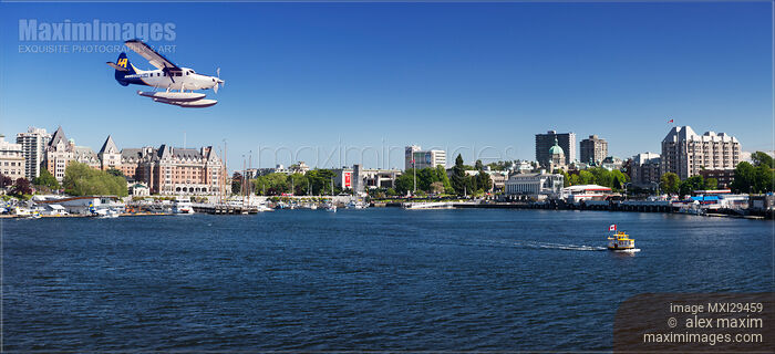 Harbour Air seaplane in front of Victoria BC harbour front skyline Stock photo of Harbour Air seaplane in front of Victoria BC harbour front skyline Buy commercial use license at MaximImages