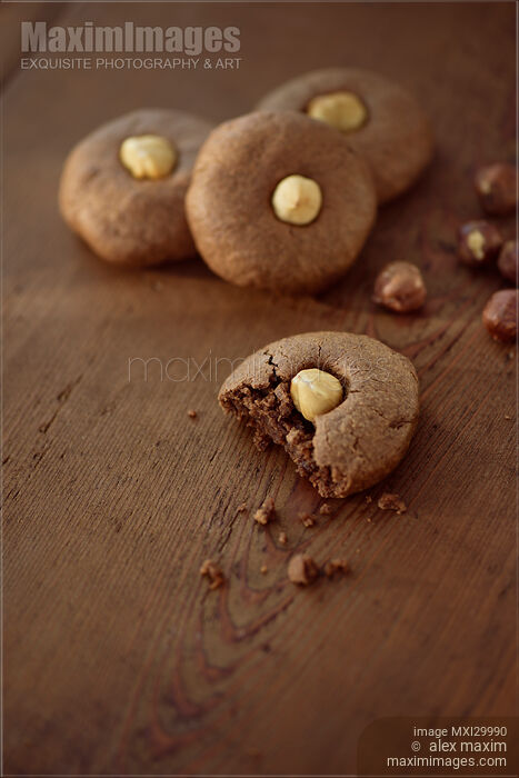 Hazelnut butter homemade cookies on brown wooden table background Stock photo of Hazelnut butter homemade cookies on brown wooden table background Buy commercial use license at MaximImages