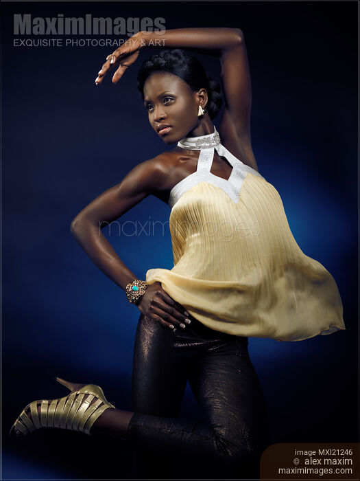 Stock photo of High Fashion Photo of a Beautiful Young Woman Buy commercial use license at MaximImages