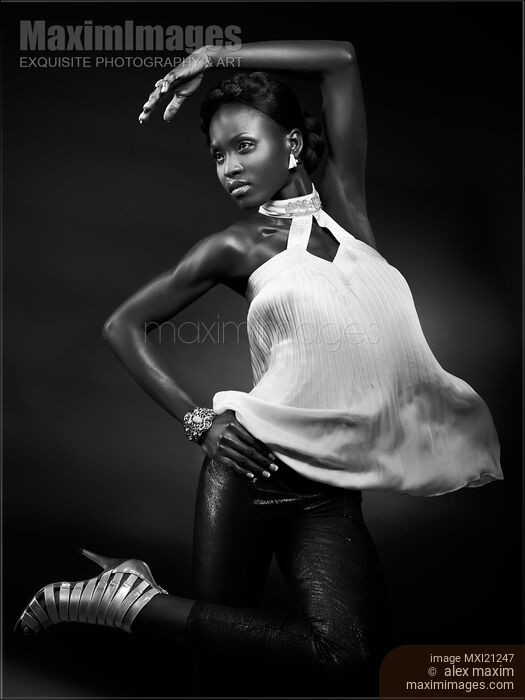 Stock photo of High Fashion Photo of a Beautiful Young Woman Buy commercial use license at MaximImages