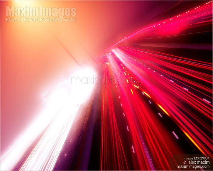 Highway traffic colorful red and white light trails on a foggy night Artistic image Stock photo of Highway traffic colorful red and white light trails on a foggy night Artistic image Buy commercial use license at MaximImages