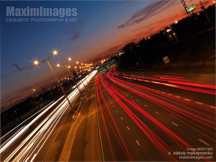 Highway Traffic During Sunset Stock photo of Highway Traffic During Sunset Buy commercial use license at MaximImages