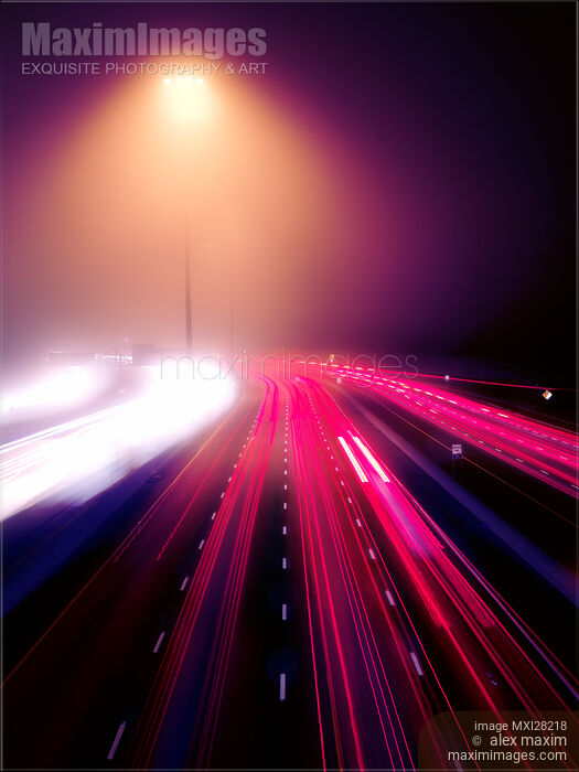 Stock photo of Highway traffic on foggy night Buy commercial use license at MaximImages