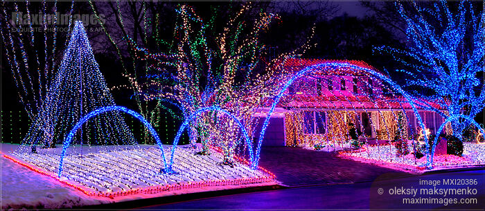 Stock photo of House Decorated with Christmas Lights Buy commercial use license at MaximImages