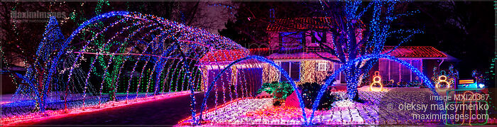 Stock photo of House Decorated with Christmas Lights Panorama Buy commercial use license at MaximImages