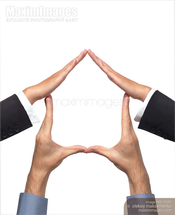 Stock photo of House Symbol Made by Hands Buy commercial use license at MaximImages