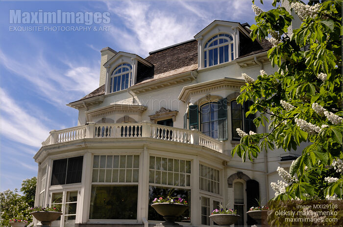 Stock photo of House Under Blue Sky Buy commercial use license at MaximImages