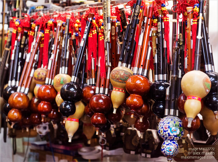 Stock photo of Hulusi, cucurbit flute at music store in China Buy commercial use license at MaximImages