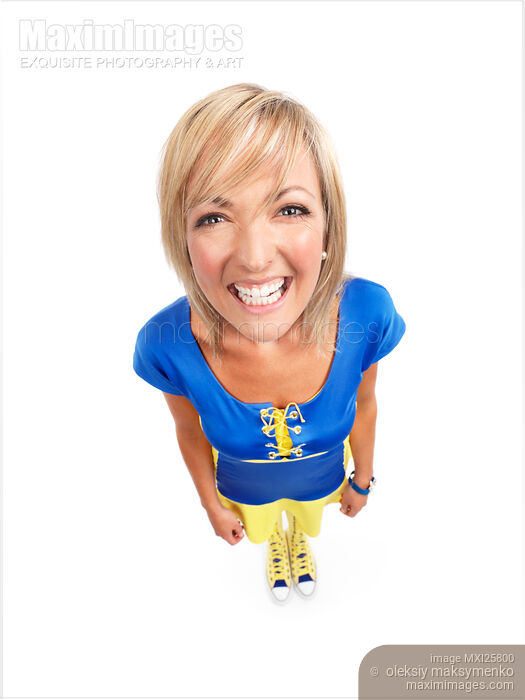 Stock photo of Humorous portrait of smiling young woman Buy commercial use license at MaximImages