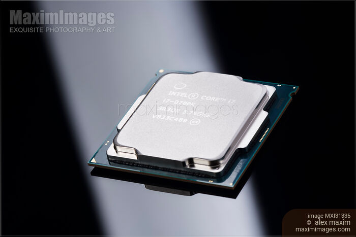 Intel Core i7 8700K processor CPU on black background Stock photo of Intel Core i7 8700K processor CPU on black background Buy commercial use license at MaximImages