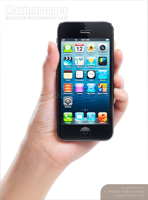 Stock photo of iPhone 5 in a hand Buy commercial use license at MaximImages