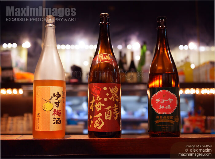 Stock photo of Japanese sake bottles in a bar Buy commercial use license at MaximImages