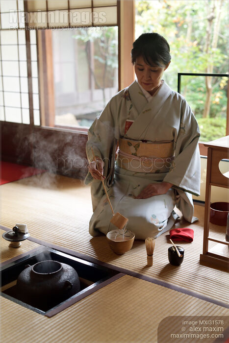 Japanese tea house tea ceremony master pouring hot water into a matcha bowl Chawan Stock photo of Japanese tea house tea ceremony master pouring hot water into a matcha bowl Chawan Buy commercial use license at MaximImages