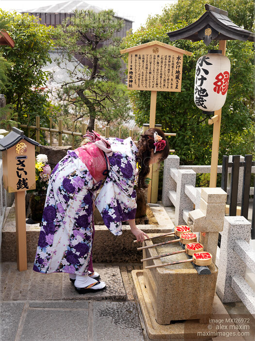 Japanese woman at Jishu Jinja shrine of love and marriage at Kiyomizu-dera in Kyoto Stock photo of Japanese woman at Jishu Jinja shrine of love and marriage at Kiyomizu-dera in Kyoto Buy commercial use license at MaximImages