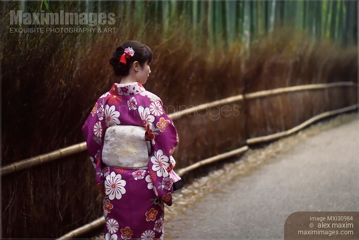 Japanese woman in a kimino walking through Arashiyama bamboo forest in Kyoto Stock photo of Japanese woman in a kimino walking through Arashiyama bamboo forest in Kyoto Buy commercial use license at MaximImages