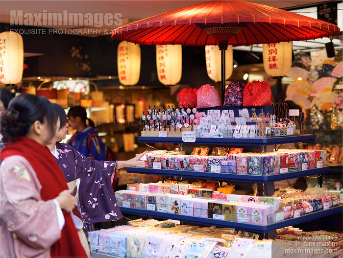 Japanese women in kimonos looking at souvenir store display in Kyoto Japan Stock photo of Japanese women in kimonos looking at souvenir store display in Kyoto Japan Buy commercial use license at MaximImages