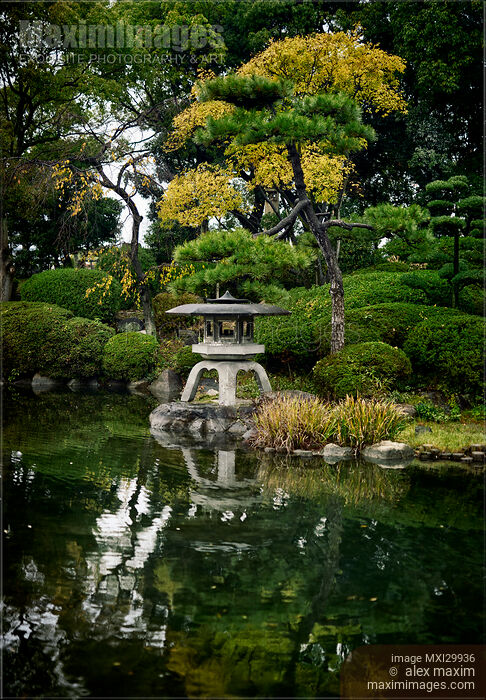 Japanese Zen garden with lantern and pond in Osaka Castle Park Stock photo of Japanese Zen garden with lantern and pond in Osaka Castle Park Buy commercial use license at MaximImages