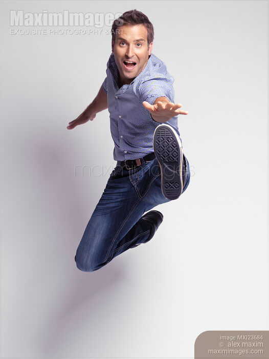 Stock photo of Jumping Young Man Buy commercial use license at MaximImages