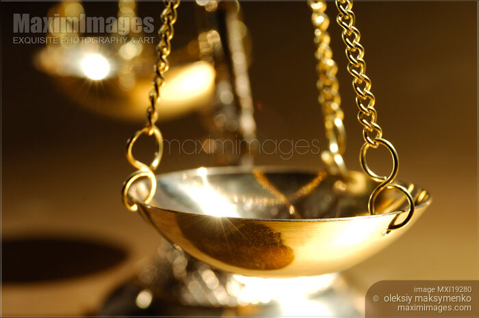 Justice Scales Closeup Stock photo of Justice Scales Closeup Buy commercial use license at MaximImages