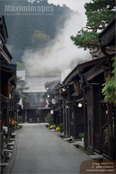 Stock photo of Kami-Sannomachi historic merchant town street in Hida-Takayama Japan misty morning scenery Buy commercial use license at MaximImages