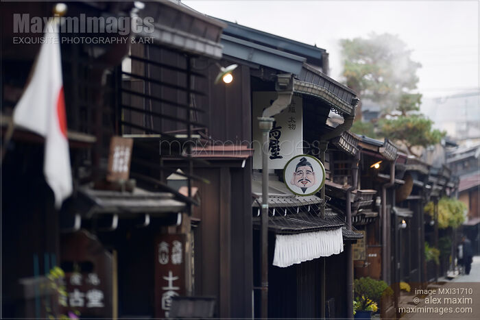 Stock photo of Kamisannomachi old town merchant street with signs of shops and restaurants in Takayama Japan Buy commercial use license at MaximImages
