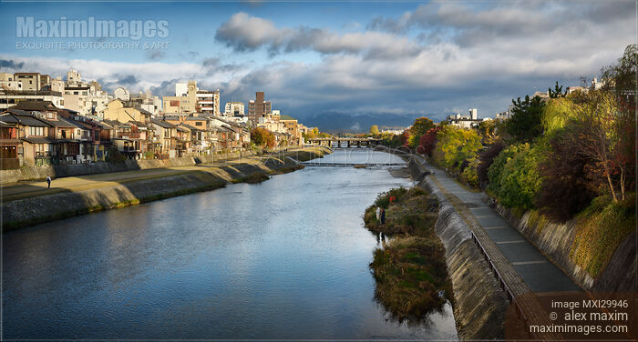 Stock photo of Kamo River Kamo-gawa panorama in beautiful dramatic sunrise Kyoto Buy commercial use license at MaximImages